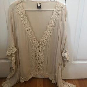 Cream colored spring sweater from local boutique